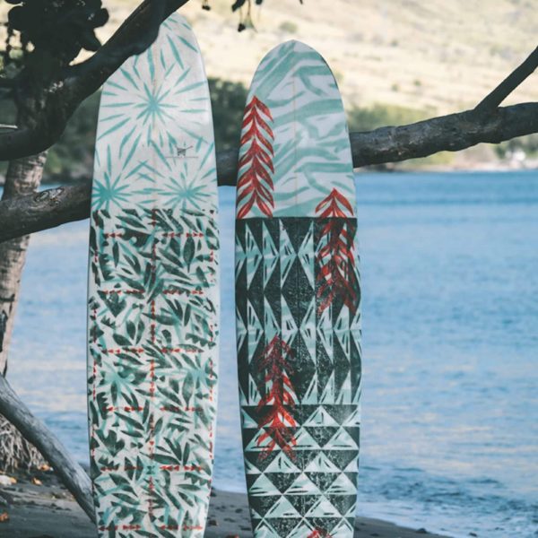 Hawaii Surfboards leaning Tree