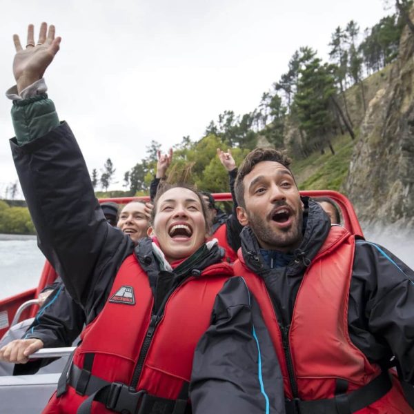 Hanmer Canterbury Couple having fun river boat adventure