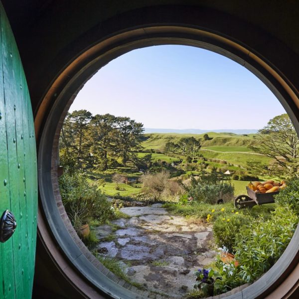 Hobbiton Matamata Waikato Lord of the Rings The Hobbit Vacation looking through the hobbit hole door
