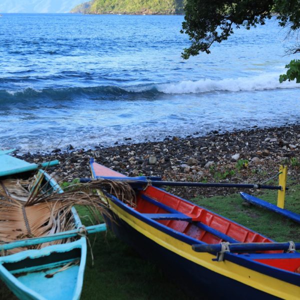 Tahiti Tahuata Canoes on Beach mountains ocean tide