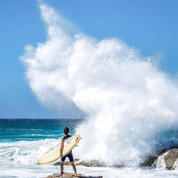 Luxury Thailand Vacation Person Holding Surfboard Standing On Rock