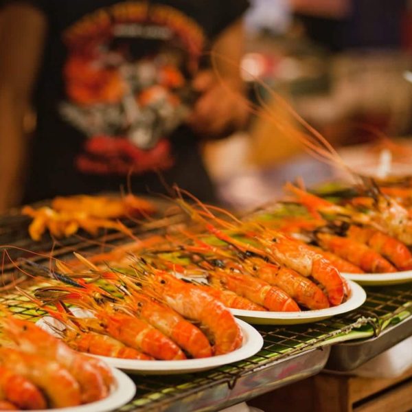 Luxury Thailand Vacation Pile Of Shrimps On Plates Bangkok Barbecue Close Up