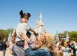 Walt Disney World Boy Riding On Dad Shoulders Magic Kingdom Cinderella Castle Mom